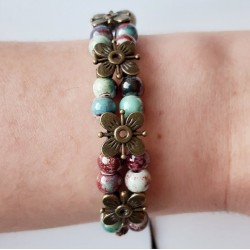 Verstelbare armband met kralen en bloemetjes