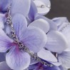 Zilveren armband met paarse bloemmetjes